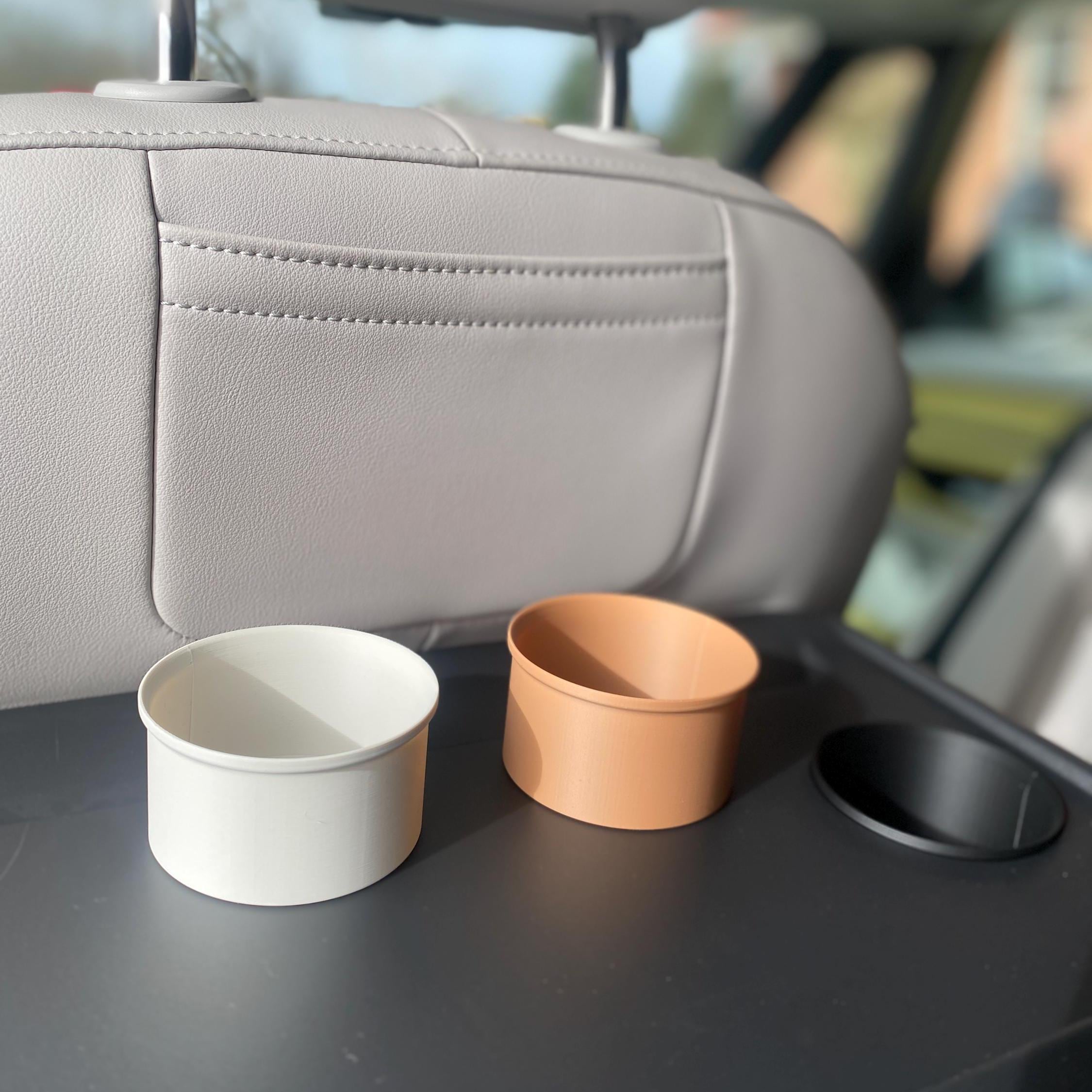 Close-up of 3D printed drink holder insert for ID. Buzz, smooth PLA surface, tight fit rear tray insert, handmade car organizer, fits standard cans, designed by 3DLabCS, van accessory for everyday use
